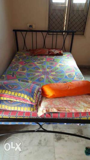 Queen size metal bed with mattress in good condition