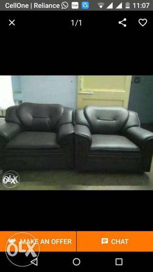 Two Black Leather Sofas