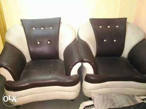 Two Black-and-white Leather Sofa Chairs