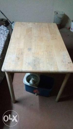 Wooden table. 6 feet by 4 feet.
