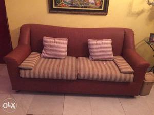 3 seater sofa. maroon outer leather base with