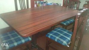 4 seater wooden dinning set with 2 chairs have