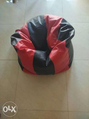 Brand new Red And Black Bean Bag plus chair. Only 5 month