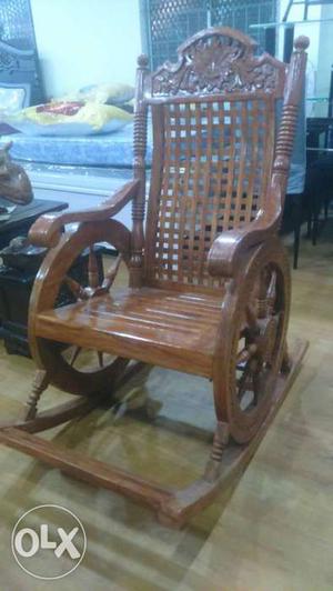 Brand new teakwood rocking chair