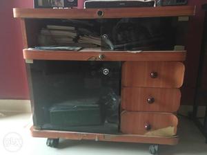 Brown Wooden Wheeled Television Stand