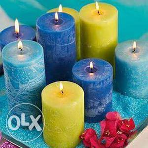 Eight Blue, Yellow, And Teal Pillar Candles