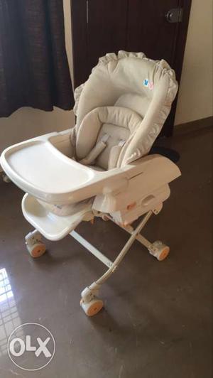 Imported baby high chair. Reclining backrest,