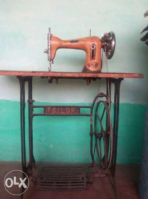 Orange And Black Tailor Treadle Sewing Machine