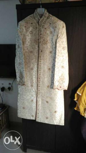 Sherwani for Men used only once. Purchased at Rs