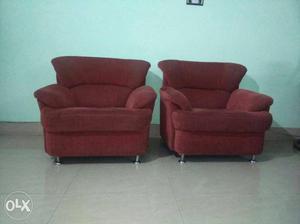 Two Maroon Fabric Padded Sofa Chairs
