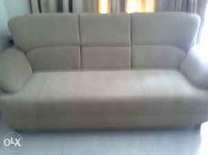 Two three seater sofas, almost new. Beige
