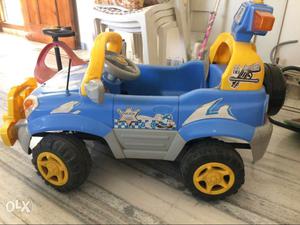 Yellow, Grey, And Blue Power Wheels