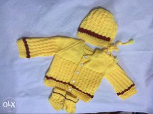 Baby's Yellow Knit Jacket And Hat