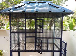 Blue And Black Metal Pet Cage