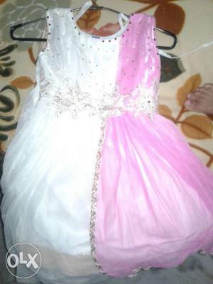 Girlish gown pink and white colour