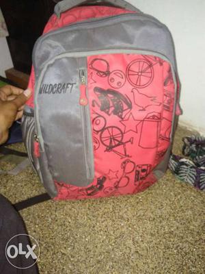 Gray And Pink Wildcraft Backpack
