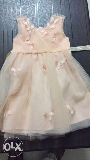 Peach Party Frock, fits 3-5 years. Wore once