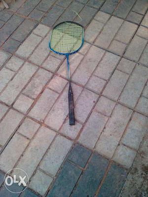 Blue Handle And Black Badminton Racket