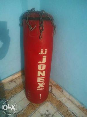 Jonex Gold Red leather punching bag with 2 Red & white