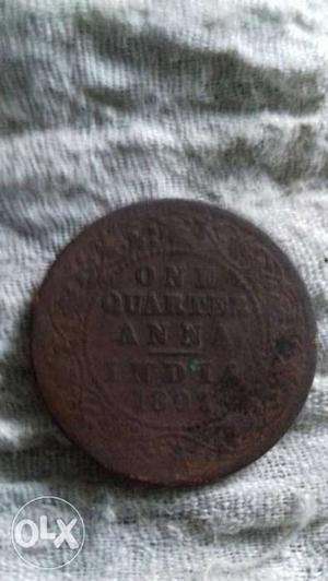 Round Black One Quarter Anna Coin