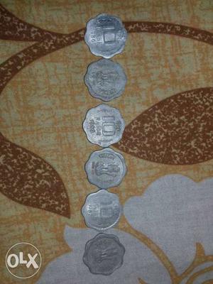 6 identical old 10 paise coins of the period