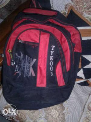 Black And Red Printed Backpack