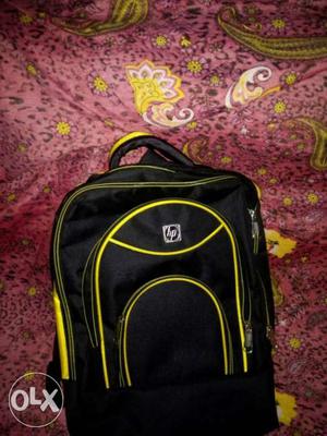 Black And Yellow HP Backpack