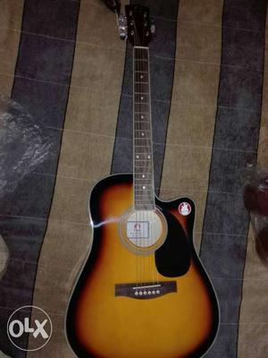 Brand new Imp guitar with 4 plectrum, 2 strings,