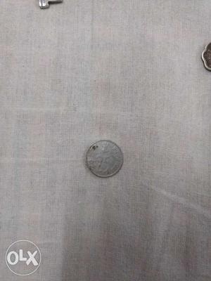 Coin of Indian currency of 25 Paisa from the year