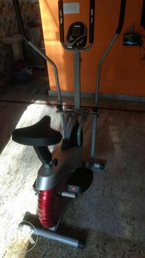 Gray And Red Elliptical Trainer
