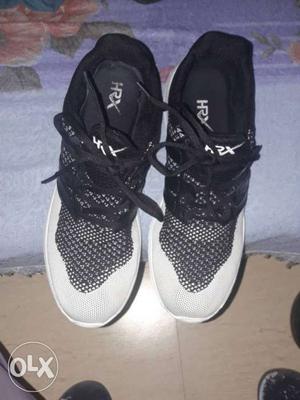 Pair Of Black-and-white HRX Low Top Sneakers