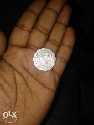 Round Scalloped Silver Coin