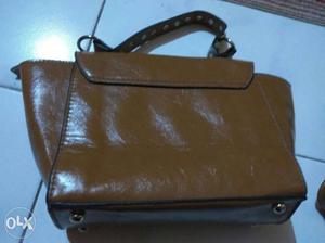 Small brown sling side Purse