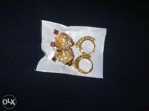 Women's Pair Of Gold Earrings