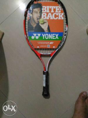 Yonex Lawn Tennis Racket Orange and white colour with black