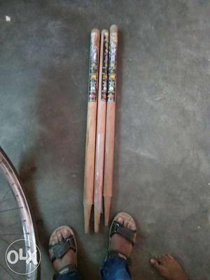 3 Brown Wooden Rods