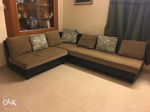 A six seater fabric sofa available for sale