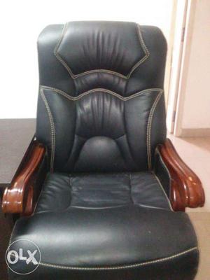 Brown Wooden Framed Black Leather Chair
