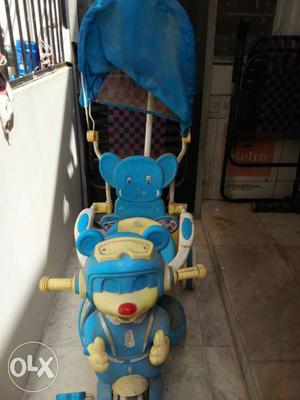 Children's Blue And Beige Pedal Trike