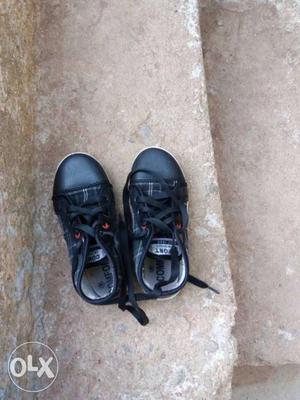 Children's Pair Of Black Low Top Shoes