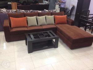 L shape sofa in brown color available in affordable price.
