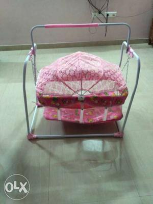 Pink And White Baby Sleeper Swing