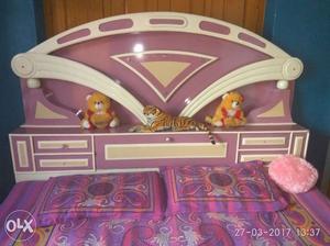 Purple And White Wooden Bed With Rack And Purple Mattress