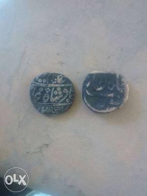 Two Black And Silver Arabic Ancient Coins