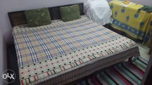 Wooden double bed. 6' x 6' size. With back rest. Without