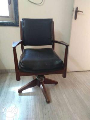 Wooden revolving chair in running condition. It is 35 years