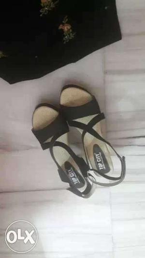 Pair Of Black Open Toe Flat Sandals