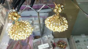 Pair Of Gold Jhumka Earrings