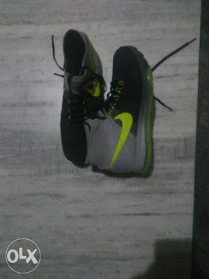 Pair Of Gray-and-black Nike Sneakers