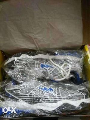 Pair Of White-black-and-gray Low Top Sneakers In Box